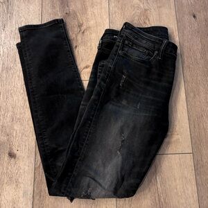 Black distressed american eagle skinny jeans